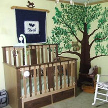 Rustic horse theme baby boy nursery with tree wall mural and homemade horse theme wall hanging