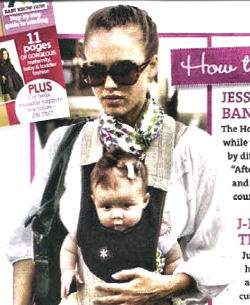 Jessica Alba wearing her stylish Belle Baby Carrier.