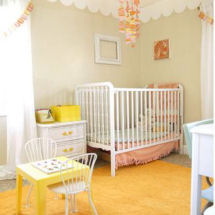 Yellow brown pastel pink and antique white baby girl nursery room decor