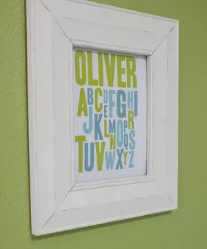 Framed baby name and alphabet letters art print for the nursery.