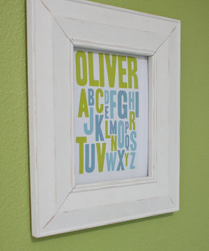 Framed baby name and alphabet letters art print for the nursery.