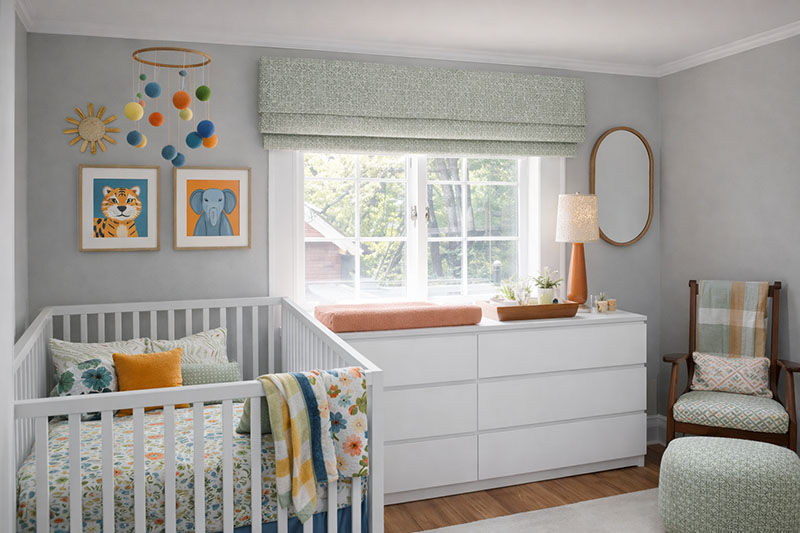 Gray and yellow baby nursery with bright accent colors and white trim