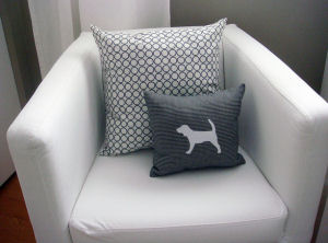 beagle silhouette pillow on contemporary modern white slipcover nursery chair