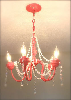 Spray painted hot pink vintage mini chandelier recycled for a baby girl nursery