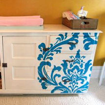 Turquoise blue, white and yellow baby nursery color scheme with custom dresser