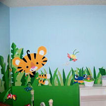 Jungle Rainforest theme neutral baby nursery with tigers and monkeys