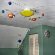 Solar system planet baby nursery theme ceiling light fixture with planets orbiting the sun