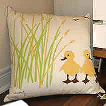 Yellow and green craft sewing project accent pillow for a  neutral baby duck nursery theme with ducky applique crib bedding and unisex decor