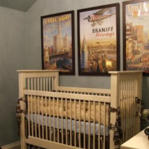 Vintage airplane nursery decor in a baby boy transportation theme room