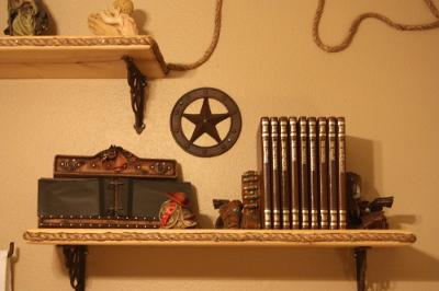 THREE HOMEMADE WESTERN WALL SHELVES DECORATED WITH ROPE AND IRON HORSESHOE NAILS