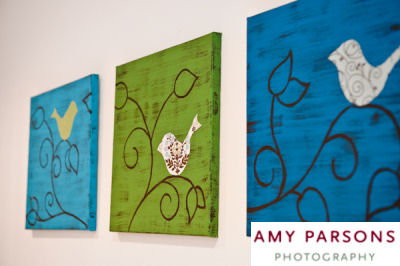 Homemade bird wall art made from canvas craft paint and fabric appliques