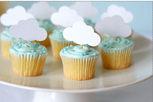 April baby shower cloud rain theme cupcakes with edible blue pearls and paper party cut outs
