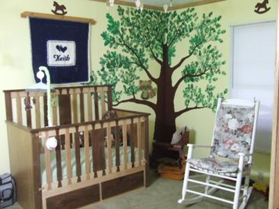 Baby Keith's unique nursery with homemade baby crib made from hardwoods including maple, oak, and black walnut woods that dad dovetailed.  