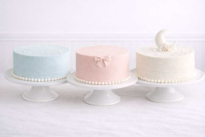 Baby shower cake ideas for boy girl and neutral themes displayed side by side