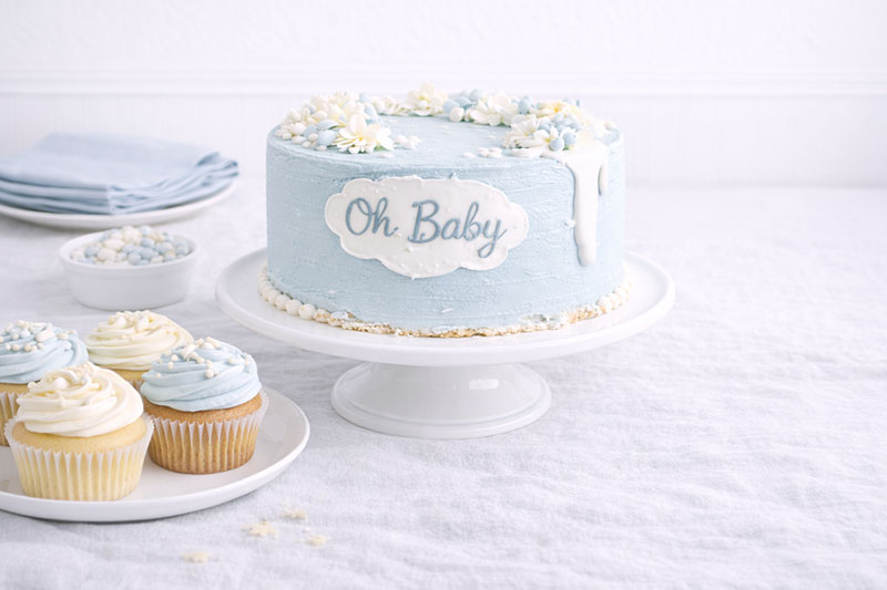 Balanced baby shower table with correct spacing and coordinated elements