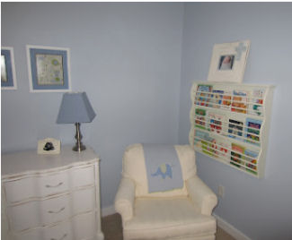 Wooden book rack for a baby nursery room wall