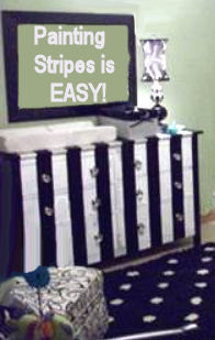 Baby dresser changer painted in black and white stripes with glass knobs