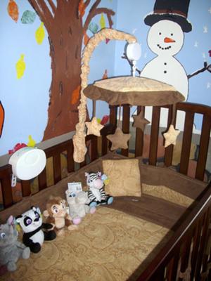 We painted the nursery walls baby blue and added glow-in-the dark stars and more! 