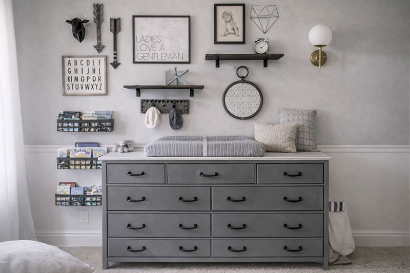 Black white and grey painted baby nursery dresser used as a changing table