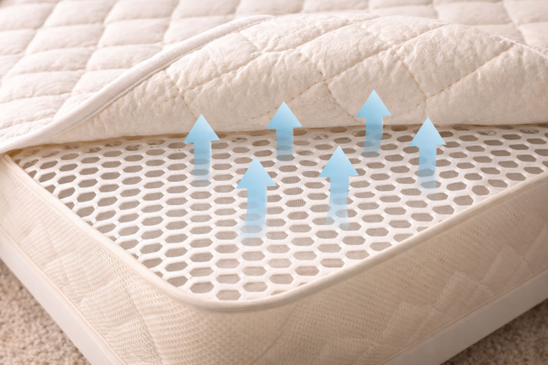 Breathable crib mattress with airflow design in a crib
