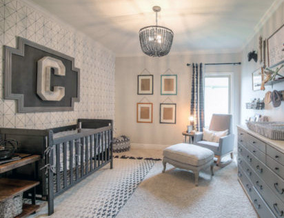 Bright black and white masculine baby nursery room for a boy