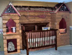 Rustic log cabin hunting and fishing theme nursery décor for a baby boy room