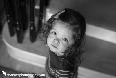 Black and white photo of a little girl by Charlotte Photography
