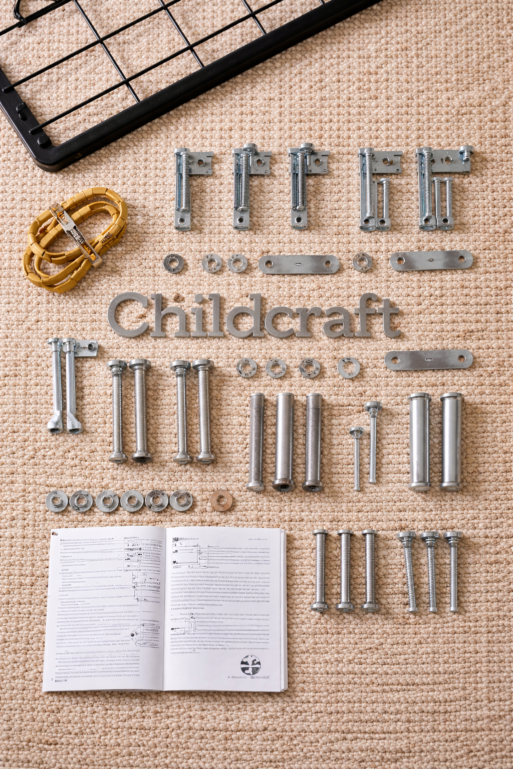 Childcraft crib hardware layout showing bolts, brackets, and mattress support components