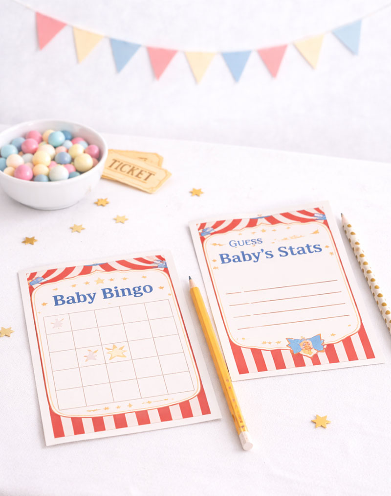 Circus baby shower game table setup with simple cards