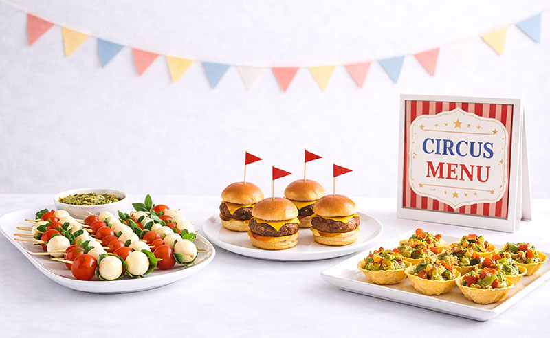 Circus baby shower menu with simple plated food arrangement