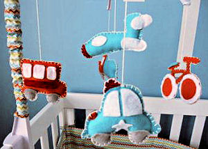 Homemade DIY Baby Crib Mobile with Cars a Bus and Bicycle Made from Felt