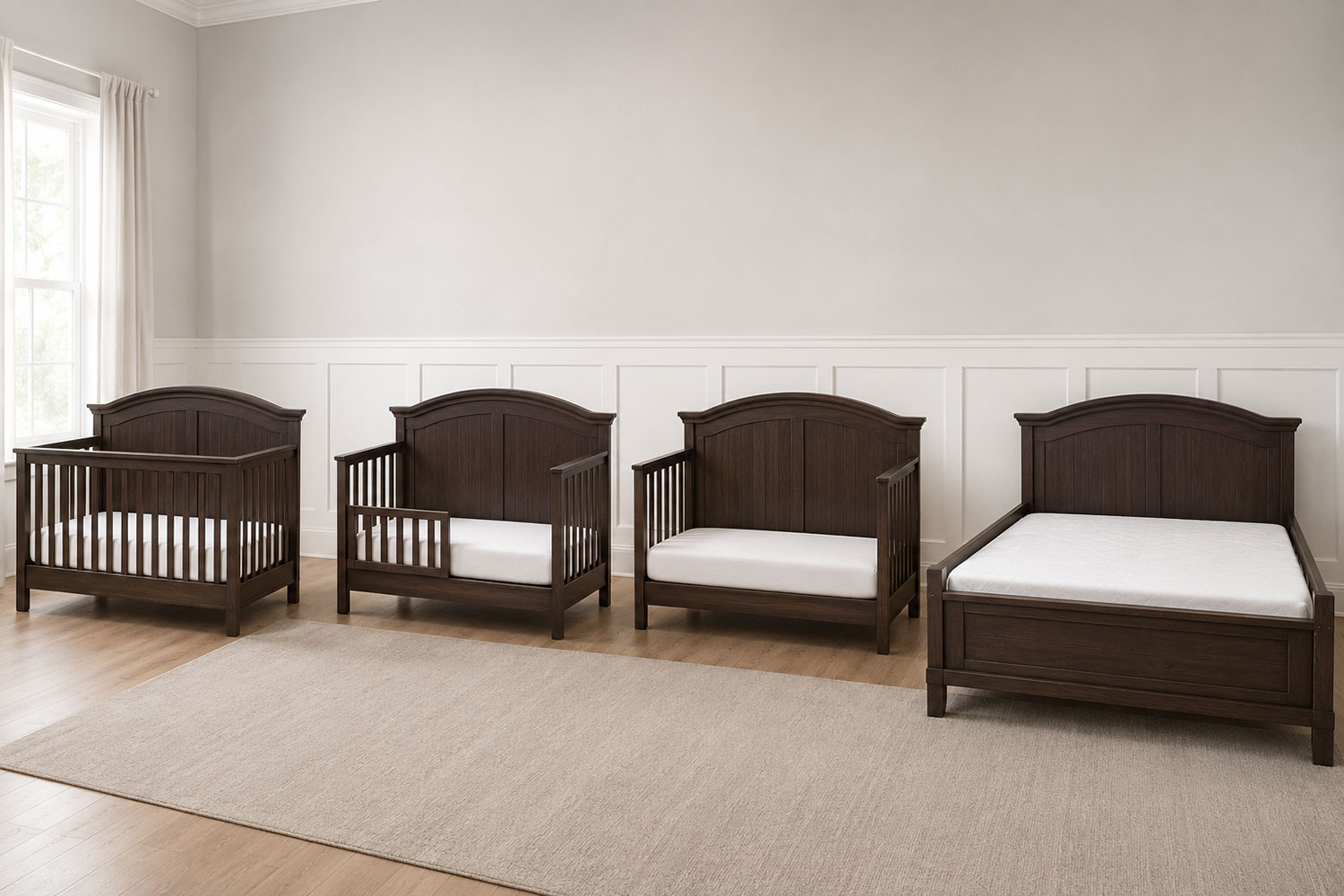 The same dark wood convertible crib shown as a crib, toddler bed, daybed, and full-size bed