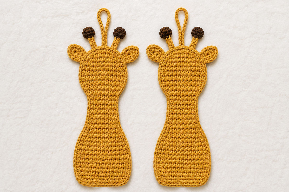 Two matching golden yellow crochet giraffe applique body panels showing the body neck and head shaping
