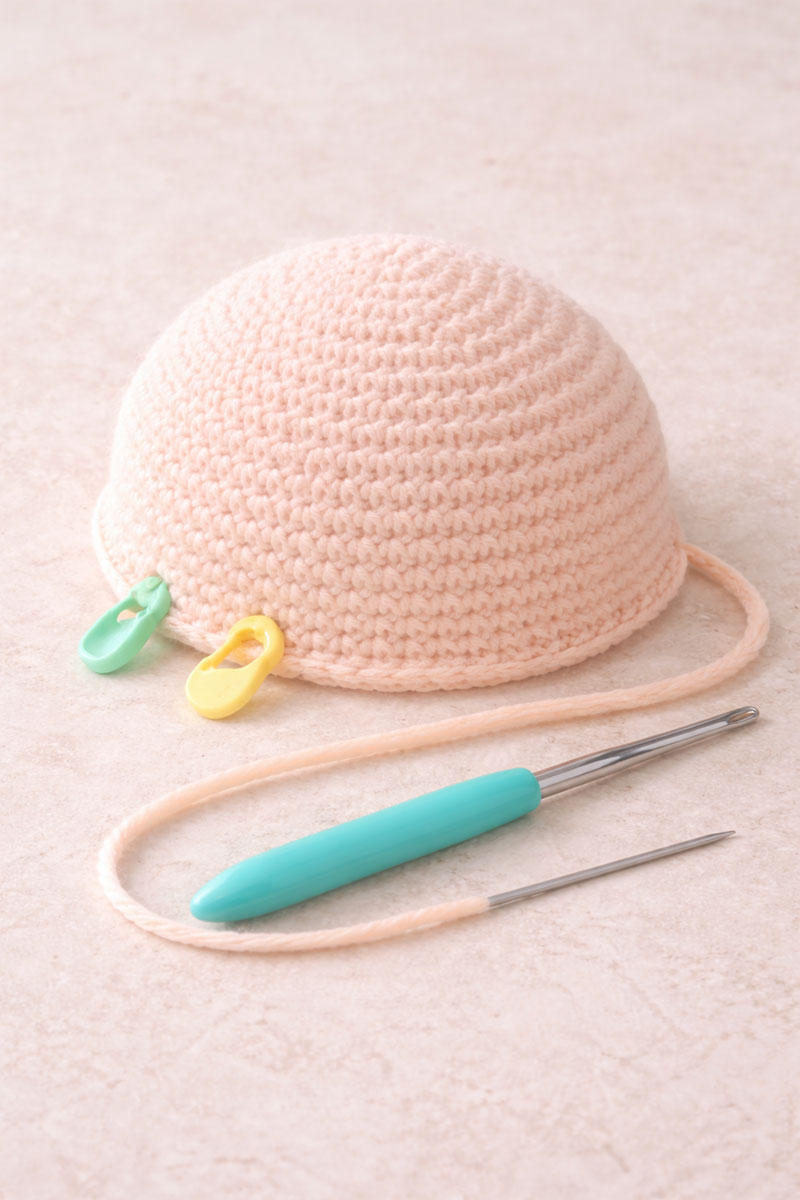 Rounded crochet jellyfish top dome with smooth stitches before adding the ruffle