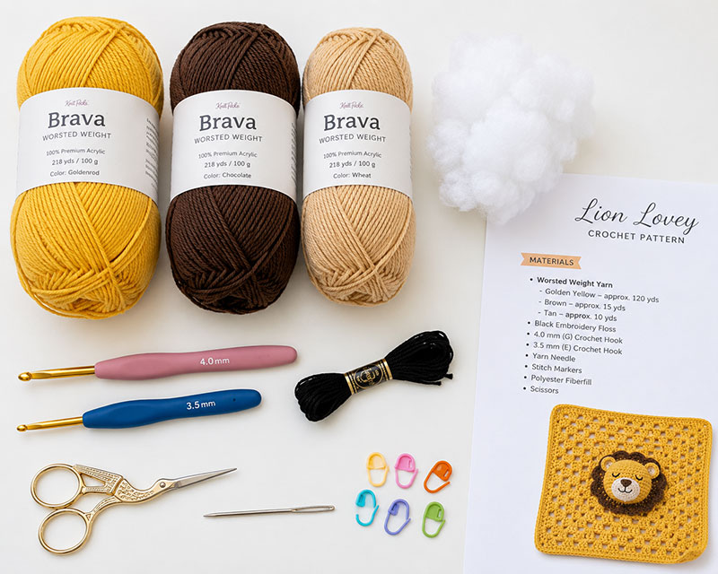 Crochet lion lovey pattern supplies with golden yellow yarn, brown yarn, tan yarn, hook, stitch markers, yarn needle and fiberfill
