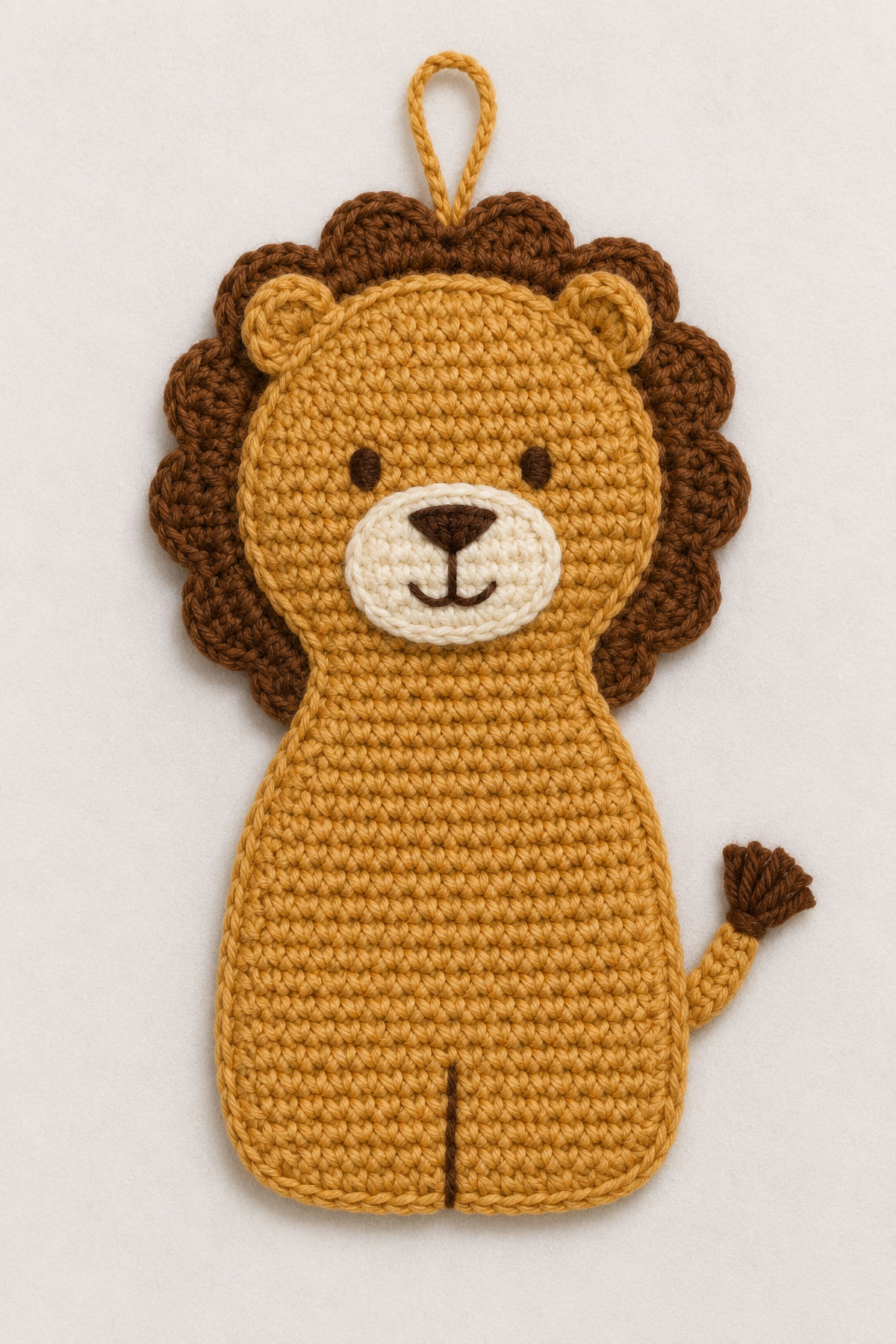 Flat crochet lion pattern piece for safari animal baby mobile