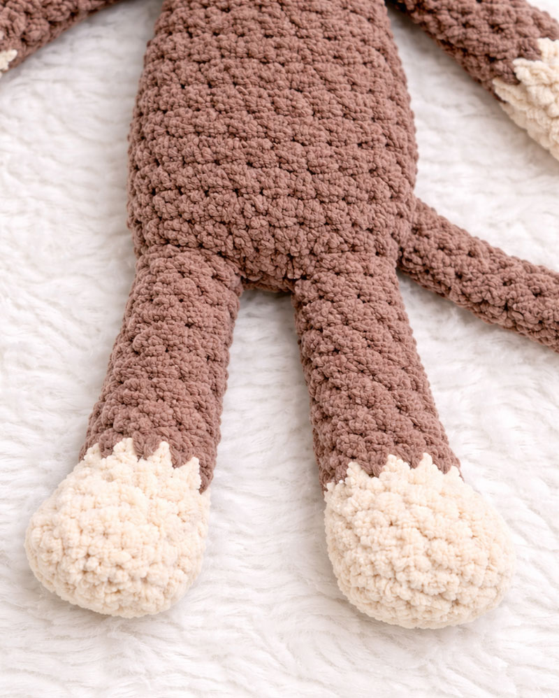 Crochet monkey body lightly filled for flexibility
