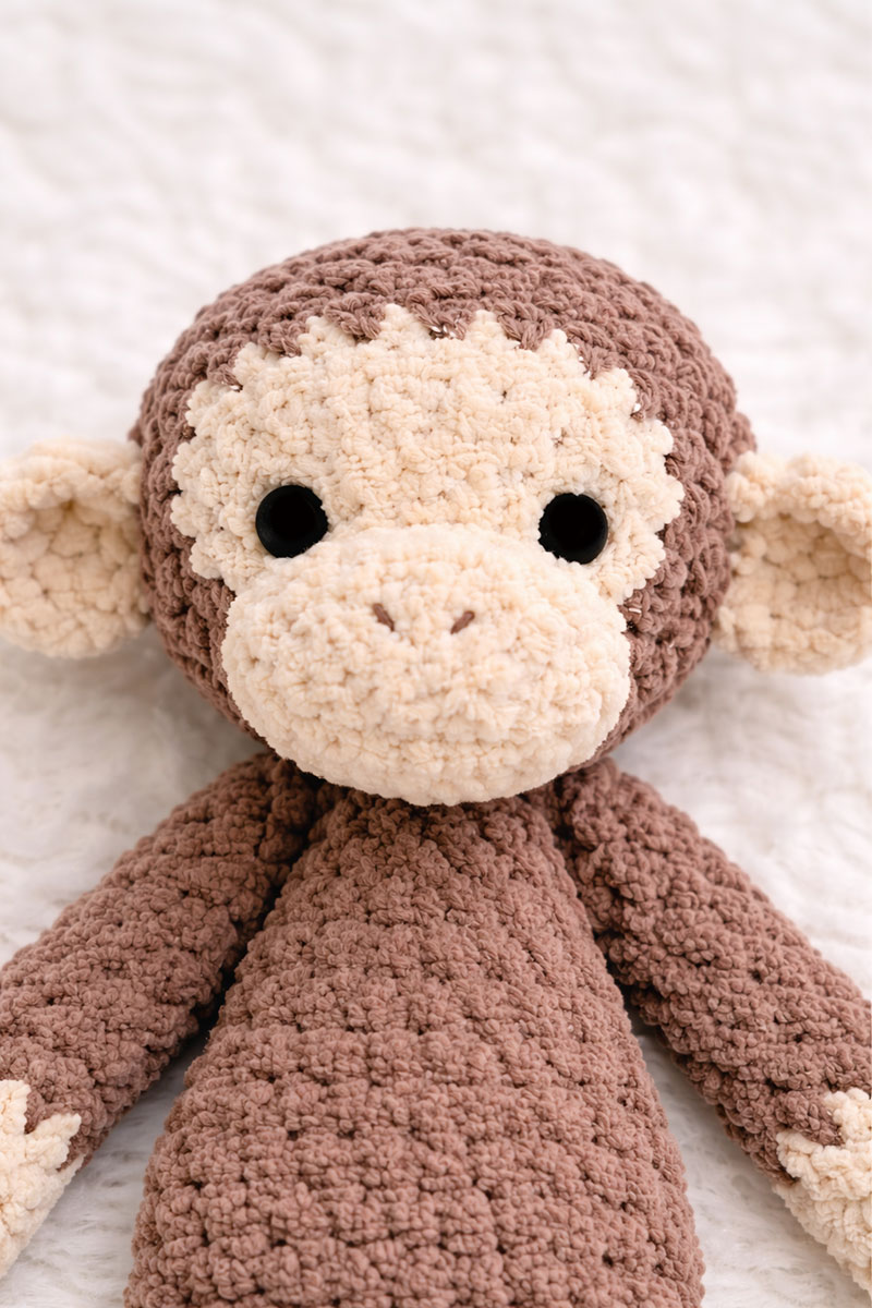Crochet monkey face showing correct muzzle and ear placement
