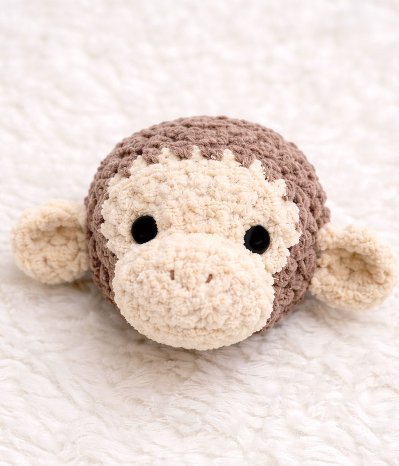 Crochet monkey head showing balanced proportions and firm structure