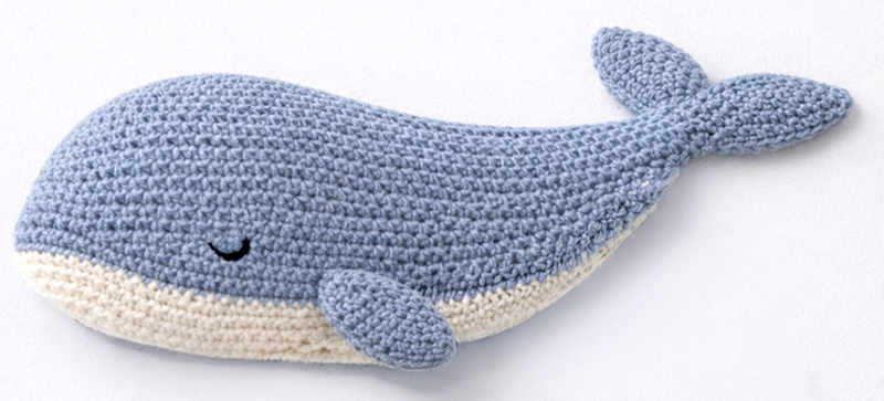 Finished crochet whale lovey with clean seams and embroidered eye detail