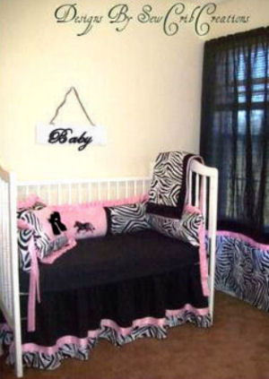 Custom black white and pink zebra print baby crib bedding set for a baby girl nursery room