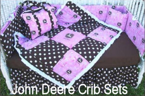 Custom black white and pink John Deere logo print baby crib bedding set for a baby girl nursery room