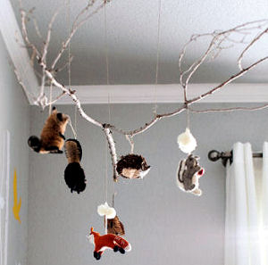 DIY homemade tree branch baby mobile with forest animals for the nursery