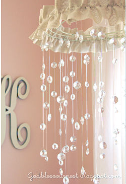 DIY baby crib mobile handmade using crystals from mom and dad's wedding