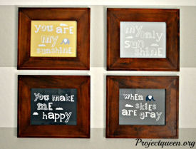 You are My Sunshine prints framed in natural wood frames for the baby's nursery gallery wall