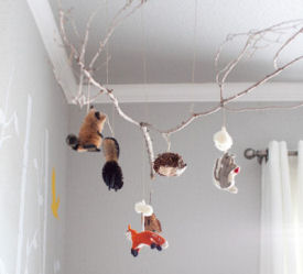 Tree branch baby nursery crib mobile with red fox deer badgers groundhogs porcupines and squirrels