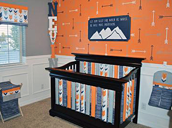 Red Fox and arrow theme DIY homemade baby crib bedding set from Spoonflower fabric in a grey and orange nursery