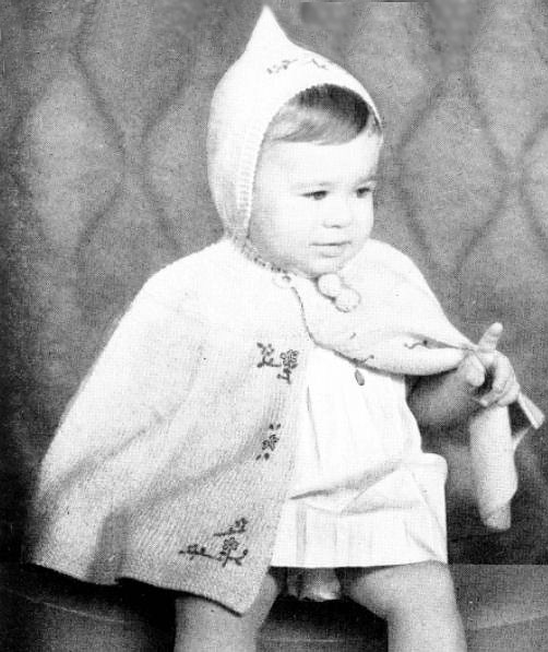 Free knitting pattern for a knit baby poncho with a hood.  Hooded baby poncho knitting pattern.