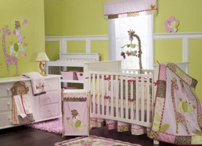 Lavender and purple giraffe crib bedding set with zebra print for a baby girl nursery room