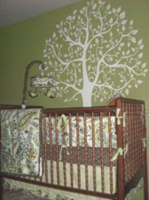 Our baby's green tree nature theme nursery with paisley crib bedding and bird baby mobile. 